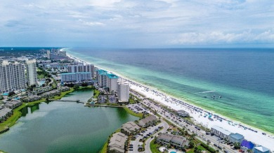 Located directly on the 16th  hole in the gated community of on Seascape Golf Course in Florida - for sale on GolfHomes.com, golf home, golf lot