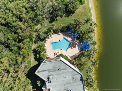 Sunsets + water views + covered parking? Yes, please! Welcome to on Ocean Club At the Hutchinson Island Beach Resort in Florida - for sale on GolfHomes.com, golf home, golf lot