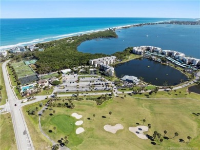 Sunsets + water views + covered parking? Yes, please! Welcome to on Ocean Club At the Hutchinson Island Beach Resort in Florida - for sale on GolfHomes.com, golf home, golf lot