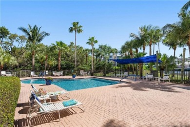 Sunsets + water views + covered parking? Yes, please! Welcome to on Ocean Club At the Hutchinson Island Beach Resort in Florida - for sale on GolfHomes.com, golf home, golf lot