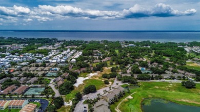 Located directly on the 16th  hole in the gated community of on Seascape Golf Course in Florida - for sale on GolfHomes.com, golf home, golf lot