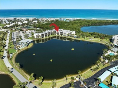 Sunsets + water views + covered parking? Yes, please! Welcome to on Ocean Club At the Hutchinson Island Beach Resort in Florida - for sale on GolfHomes.com, golf home, golf lot