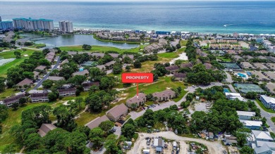 Located directly on the 16th  hole in the gated community of on Seascape Golf Course in Florida - for sale on GolfHomes.com, golf home, golf lot