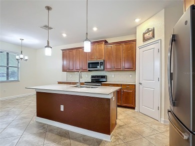 Spacious Multi-Generational Living with PRIVATE IN-LAW SUITE on Providence Golf Club in Florida - for sale on GolfHomes.com, golf home, golf lot