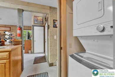 Turnkey Mountain Escape with Slope-Side Access - Snow Ridge on Jack Frost National Golf Course in Pennsylvania - for sale on GolfHomes.com, golf home, golf lot