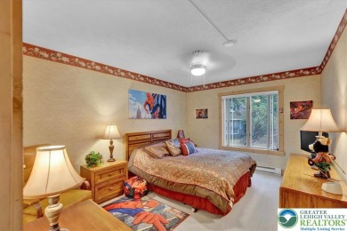 Turnkey Mountain Escape with Slope-Side Access - Snow Ridge on Jack Frost National Golf Course in Pennsylvania - for sale on GolfHomes.com, golf home, golf lot