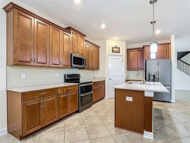 Spacious Multi-Generational Living with PRIVATE IN-LAW SUITE on Providence Golf Club in Florida - for sale on GolfHomes.com, golf home, golf lot