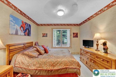 Turnkey Mountain Escape with Slope-Side Access - Snow Ridge on Jack Frost National Golf Course in Pennsylvania - for sale on GolfHomes.com, golf home, golf lot