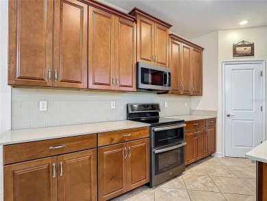 Spacious Multi-Generational Living with PRIVATE IN-LAW SUITE on Providence Golf Club in Florida - for sale on GolfHomes.com, golf home, golf lot