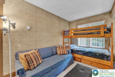 Turnkey Mountain Escape with Slope-Side Access - Snow Ridge on Jack Frost National Golf Course in Pennsylvania - for sale on GolfHomes.com, golf home, golf lot