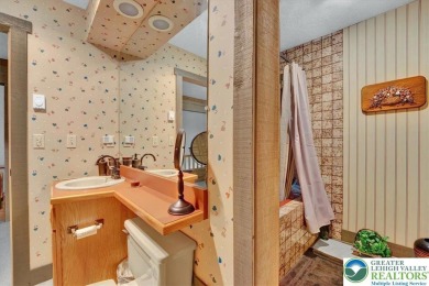 Turnkey Mountain Escape with Slope-Side Access - Snow Ridge on Jack Frost National Golf Course in Pennsylvania - for sale on GolfHomes.com, golf home, golf lot