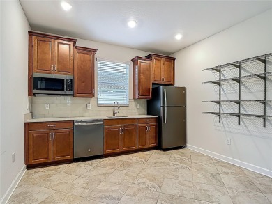 Spacious Multi-Generational Living with PRIVATE IN-LAW SUITE on Providence Golf Club in Florida - for sale on GolfHomes.com, golf home, golf lot