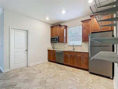 Spacious Multi-Generational Living with PRIVATE IN-LAW SUITE on Providence Golf Club in Florida - for sale on GolfHomes.com, golf home, golf lot