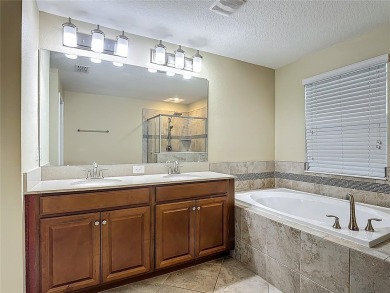 Spacious Multi-Generational Living with PRIVATE IN-LAW SUITE on Providence Golf Club in Florida - for sale on GolfHomes.com, golf home, golf lot