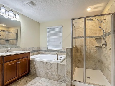 Spacious Multi-Generational Living with PRIVATE IN-LAW SUITE on Providence Golf Club in Florida - for sale on GolfHomes.com, golf home, golf lot