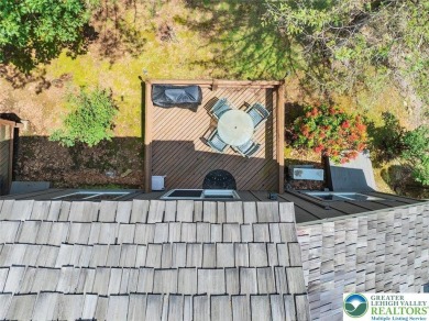 Turnkey Mountain Escape with Slope-Side Access - Snow Ridge on Jack Frost National Golf Course in Pennsylvania - for sale on GolfHomes.com, golf home, golf lot
