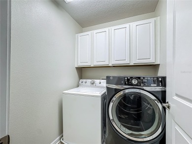 Spacious Multi-Generational Living with PRIVATE IN-LAW SUITE & on Providence Golf Club in Florida - for sale on GolfHomes.com, golf home, golf lot