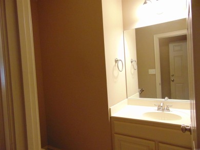 Spacious home that features 4 bedrooms & 2 1/2 baths, Tile in on The Country Club of Arkansas in Arkansas - for sale on GolfHomes.com, golf home, golf lot