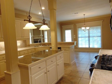 Spacious home that features 4 bedrooms & 2 1/2 baths, Tile in on The Country Club of Arkansas in Arkansas - for sale on GolfHomes.com, golf home, golf lot