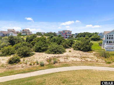This level golf course homesite, located in the prestigious on The Currituck Golf Club in North Carolina - for sale on GolfHomes.com, golf home, golf lot