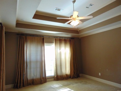 Spacious home that features 4 bedrooms & 2 1/2 baths, Tile in on The Country Club of Arkansas in Arkansas - for sale on GolfHomes.com, golf home, golf lot