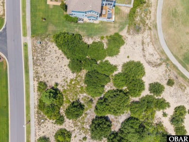 This level golf course homesite, located in the prestigious on The Currituck Golf Club in North Carolina - for sale on GolfHomes.com, golf home, golf lot
