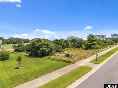 This level golf course homesite, located in the prestigious on The Currituck Golf Club in North Carolina - for sale on GolfHomes.com, golf home, golf lot