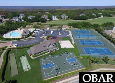 This level golf course homesite, located in the prestigious on The Currituck Golf Club in North Carolina - for sale on GolfHomes.com, golf home, golf lot