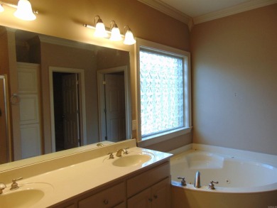 Spacious home that features 4 bedrooms & 2 1/2 baths, Tile in on The Country Club of Arkansas in Arkansas - for sale on GolfHomes.com, golf home, golf lot