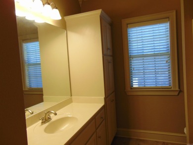 Spacious home that features 4 bedrooms & 2 1/2 baths, Tile in on The Country Club of Arkansas in Arkansas - for sale on GolfHomes.com, golf home, golf lot