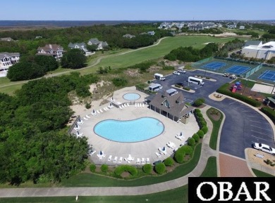 This level golf course homesite, located in the prestigious on The Currituck Golf Club in North Carolina - for sale on GolfHomes.com, golf home, golf lot