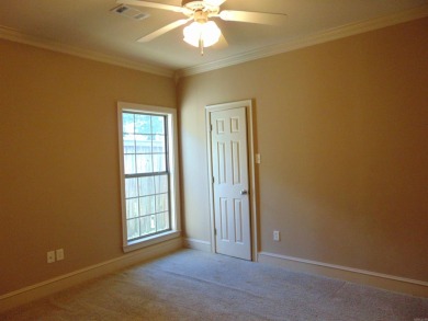 Spacious home that features 4 bedrooms & 2 1/2 baths, Tile in on The Country Club of Arkansas in Arkansas - for sale on GolfHomes.com, golf home, golf lot