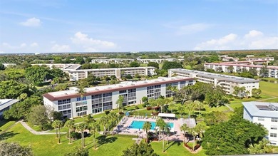 Step into this fully updated, move-in-ready gem in the highly on Wynmoor Golf Course in Florida - for sale on GolfHomes.com, golf home, golf lot