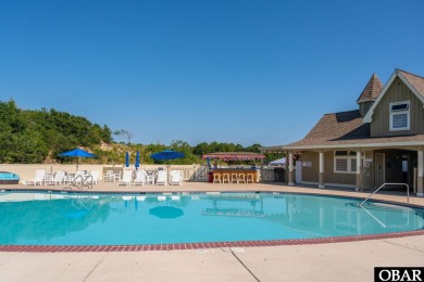 This level golf course homesite, located in the prestigious on The Currituck Golf Club in North Carolina - for sale on GolfHomes.com, golf home, golf lot