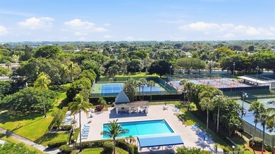 Step into this fully updated, move-in-ready gem in the highly on Wynmoor Golf Course in Florida - for sale on GolfHomes.com, golf home, golf lot