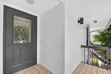 Nestled in the exclusive Quail Ridge Country Club, this 3-bed on Quail Ridge Golf Course and Country Club in Florida - for sale on GolfHomes.com, golf home, golf lot
