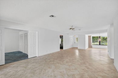 Nestled in the exclusive Quail Ridge Country Club, this 3-bed on Quail Ridge Golf Course and Country Club in Florida - for sale on GolfHomes.com, golf home, golf lot
