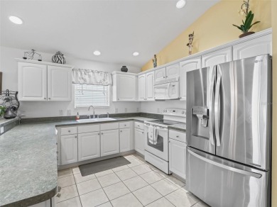 Welcome to this lovely Eagle model in Kingfisher Villas, located on The Links of Spruce Creek in Florida - for sale on GolfHomes.com, golf home, golf lot