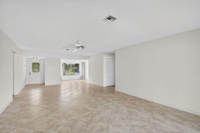 Nestled in the exclusive Quail Ridge Country Club, this 3-bed on Quail Ridge Golf Course and Country Club in Florida - for sale on GolfHomes.com, golf home, golf lot