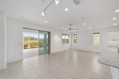 On the golf course, rear privacy, and a very large lanai covered on On Top of the World Golf Course in Florida - for sale on GolfHomes.com, golf home, golf lot