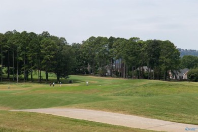 Masterfully situated on the 17th hole of RTJ Highlands, this on Robert Trent Jones Golf Trail - Hampton Cove in Alabama - for sale on GolfHomes.com, golf home, golf lot