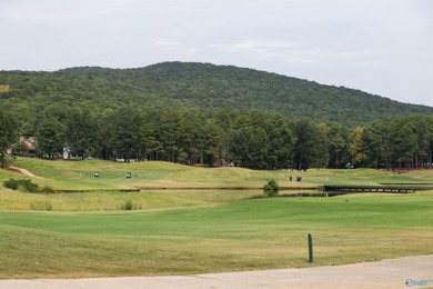 Masterfully situated on the 17th hole of RTJ Highlands, this on Robert Trent Jones Golf Trail - Hampton Cove in Alabama - for sale on GolfHomes.com, golf home, golf lot