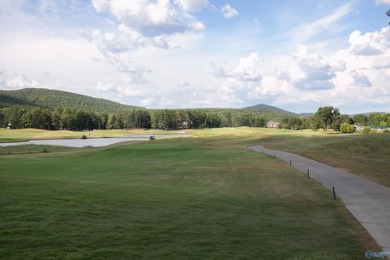 Masterfully situated on the 17th hole of RTJ Highlands, this on Robert Trent Jones Golf Trail - Hampton Cove in Alabama - for sale on GolfHomes.com, golf home, golf lot