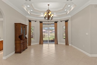 Step into this beautifully maintained 3-bedroom, 2.5-bath golf on Emerald Bay Golf Club in Florida - for sale on GolfHomes.com, golf home, golf lot