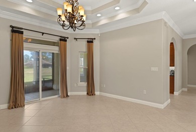 Step into this beautifully maintained 3-bedroom, 2.5-bath golf on Emerald Bay Golf Club in Florida - for sale on GolfHomes.com, golf home, golf lot