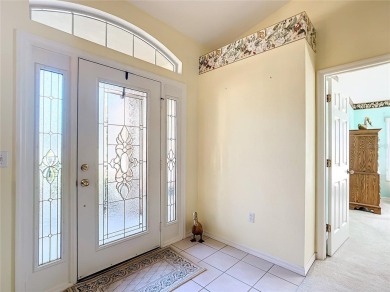 Lovely stucco turn-key 3 bedroom/2 bath, ASPEN style home in on Eagle Ridge At Spruce Creek Country Club in Florida - for sale on GolfHomes.com, golf home, golf lot