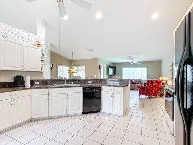 Lovely stucco turn-key 3 bedroom/2 bath, ASPEN style home in on Eagle Ridge At Spruce Creek Country Club in Florida - for sale on GolfHomes.com, golf home, golf lot