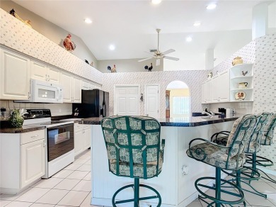 Lovely stucco turn-key 3 bedroom/2 bath, ASPEN style home in on Eagle Ridge At Spruce Creek Country Club in Florida - for sale on GolfHomes.com, golf home, golf lot