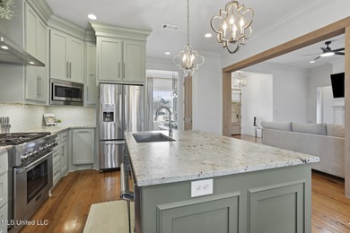 GORGEOUS PROPERTY MADE AVAILABLE DUE TO CORPORATE RELOCATION on Lake Caroline Golf Club in Mississippi - for sale on GolfHomes.com, golf home, golf lot