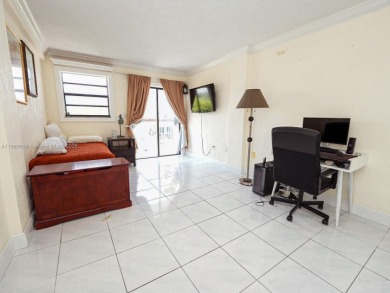 Spacious 2 bedroom, 2 bathroom home filled with natural sunlight on Normandy Shores Golf Course in Florida - for sale on GolfHomes.com, golf home, golf lot